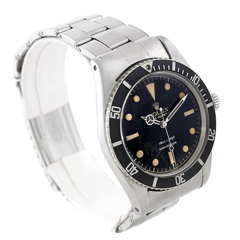 This image shows a Rolex Vintage Collection 5508 Men's Stainless Steel Black Dial 5508 Men's Stainless Steel Black Dial watch at an angle highlighting its face, bezel, and stainless steel bracelet.