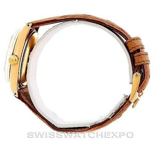 This side view shows the case, crown, and brown leather strap of the Vintage Collection model by Rolex.