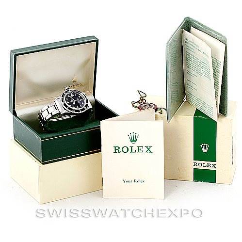 The image shows a Rolex Vintage Collection 1680 Men's Stainless Steel Black Dial 1680 Men's Stainless Steel Black Dial watch in its open box, with accompanying warranty, booklet, and additional packaging.