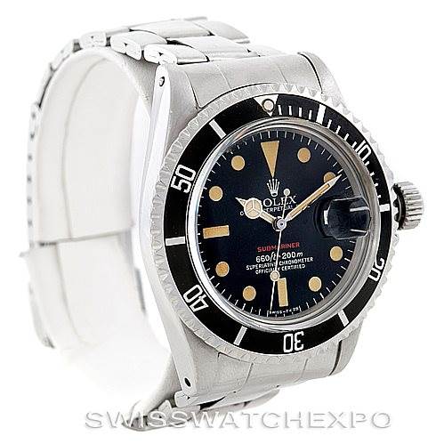 The Vintage Collection Rolex watch is shown at a slight angle, displaying its face, bezel, crown, and bracelet.