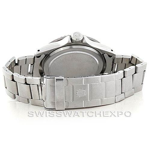 This image shows the back view of a Rolex Vintage Collection 1680 Men's Stainless Steel Black Dial 1680 Men's Stainless Steel Black Dial watch, focusing on the case, bracelet, and clasp.