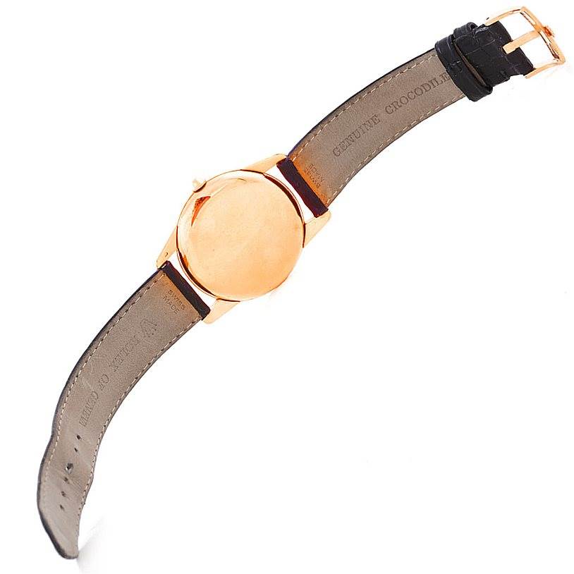 The image shows the back view of the Vintage Collection Rolex watch along with its leather strap and buckle.