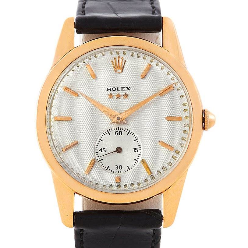This image shows a frontal view of the Rolex Vintage Collection 8405 Men's Rose Gold Silver Dial 8405 Men's Rose Gold Silver Dial model, highlighting its dial, hands, and leather strap.