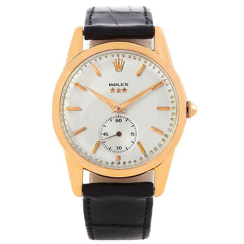 The image shows a front view of the Vintage Collection Rolex watch, highlighting its dial, case, hands, and leather strap.