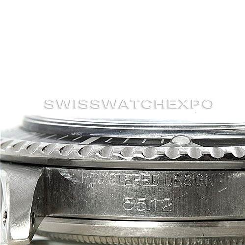 This image shows a close-up angle of the case side and bezel of the Rolex Vintage Collection 5512 Men
s Stainless Steel  5512 Men
s Stainless Steel  model 5512, highlighting the "REGISTERED DESIGN" engraving.