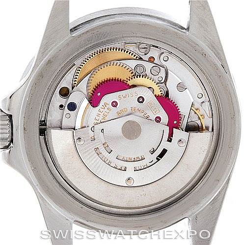 The image shows the inner mechanism of a Vintage Collection Rolex watch viewed from the back.