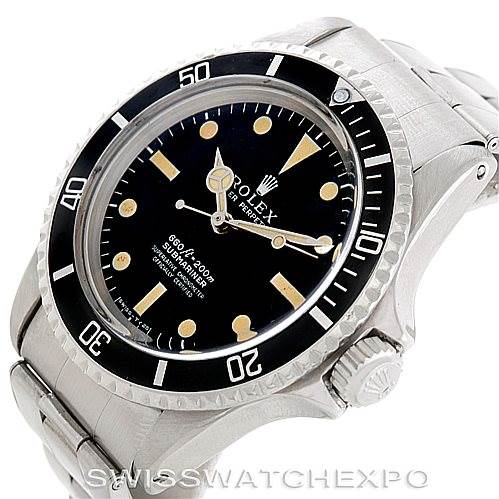 The image shows a side angle of the Vintage Collection Rolex Submariner watch, highlighting its face, bezel, crown, and bracelet.
