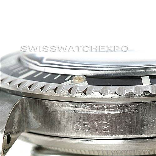 This close-up image of a Rolex Vintage Collection 5512 Men's Stainless Steel  5512 Men's Stainless Steel  model shows the side engraving with the model number (5512) and a partial view of the bezel and crystal.