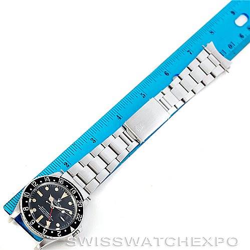 The image shows a Rolex Vintage Collection 16750 Men's Stainless Steel Black Dial 16750 Men's Stainless Steel Black Dial watch laid flat next to a ruler, displaying the full bracelet and watch face from above.