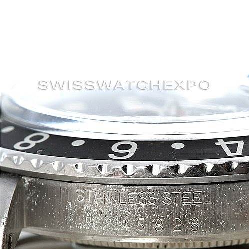 This close-up image shows the side view of the bezel and case of a Rolex Vintage Collection 16750 Men's Stainless Steel Black Dial 16750 Men's Stainless Steel Black Dial watch, highlighting the stainless steel and part of the bezel's engraving.