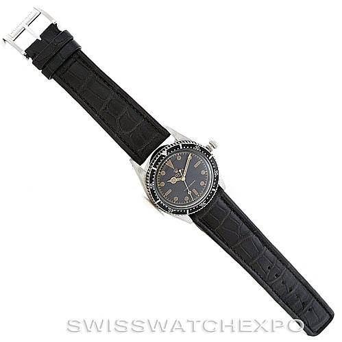 This image shows a top-view angle of a Rolex Vintage Collection 6202 Men's Stainless Steel Black Dial 6202 Men's Stainless Steel Black Dial model, highlighting the black leather strap and watch face.