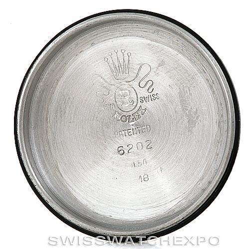 This image shows the inside case back of a Rolex Vintage Collection 6202 Men's Stainless Steel Black Dial 6202 Men's Stainless Steel Black Dial watch, with model number and branding inscriptions.