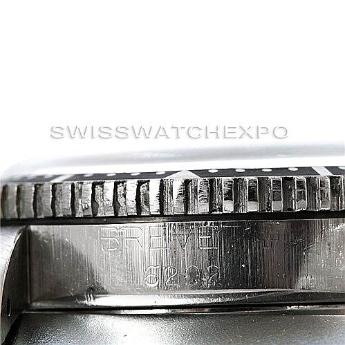 This is a side view of the Rolex Vintage Collection 6202 Men's Stainless Steel Black Dial 6202 Men's Stainless Steel Black Dial model showing the bezel and part of the case with engravings.