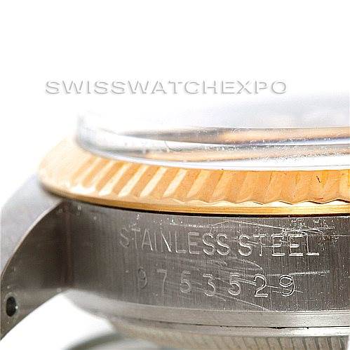 The close-up image shows the side view of a Rolex Vintage Collection 16013 Men's Stainless Steel Champagne Dial 16013 Men's Stainless Steel Champagne Dial model focusing on the stainless steel case and serial number.