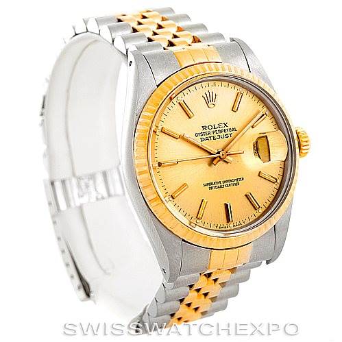 This image shows a Rolex Vintage Collection 16013 Men's Stainless Steel Champagne Dial 16013 Men's Stainless Steel Champagne Dial Datejust watch at a three-quarter angle, highlighting its two-tone bracelet, dial, and case.