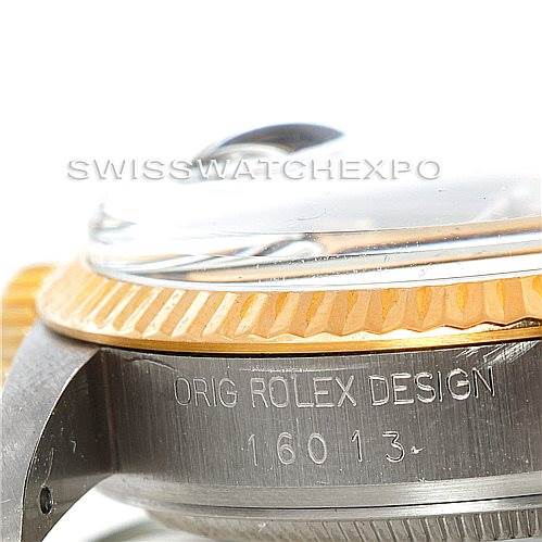 The image shows a close-up angle of the bezel, case, and case engraving of a Vintage Collection Rolex watch, model 16013.