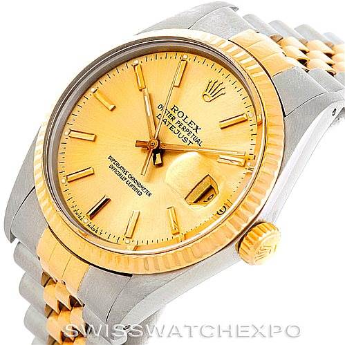 This image shows a Rolex Vintage Collection 16013 Men's Stainless Steel Champagne Dial 16013 Men's Stainless Steel Champagne Dial watch at an angled side view, highlighting its gold bezel, dial, crown, and two-tone bracelet.