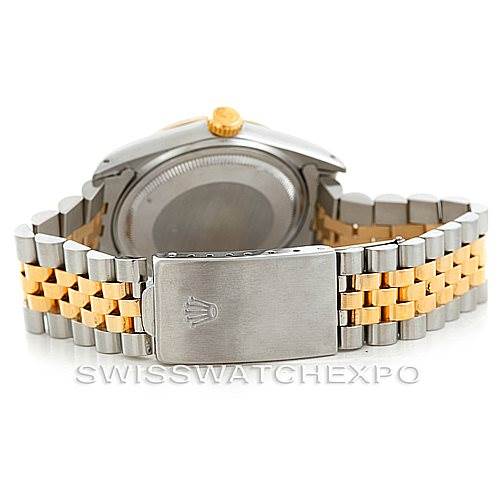 The image shows the back view of a Rolex Vintage Collection 16013 Men's Stainless Steel Champagne Dial 16013 Men's Stainless Steel Champagne Dial watch focusing on its clasp and bracelet.