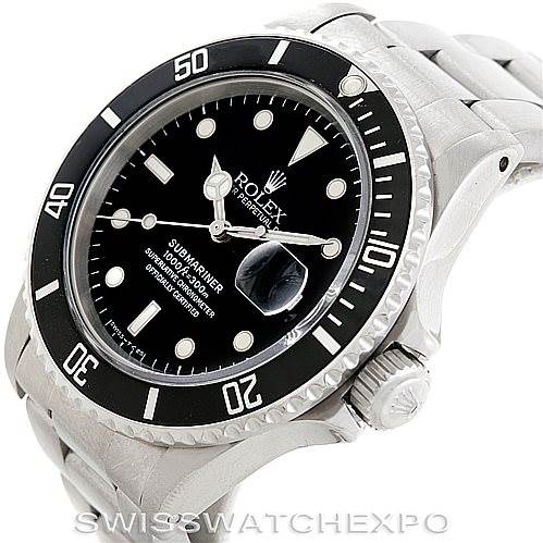This image shows a Rolex Vintage Collection 168000 Men's Stainless Steel Black Dial 168000 Men's Stainless Steel Black Dial Submariner watch at an angled top view, highlighting the face, bezel, and part of the bracelet.