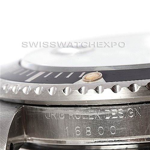 The image shows a close-up of the bezel and case side, revealing the "ORIG ROLEX DESIGN 16800" engraving on the Rolex Vintage Collection 16800 Men's Stainless Steel Black Dial 16800 Men's Stainless Steel Black Dial model watch.