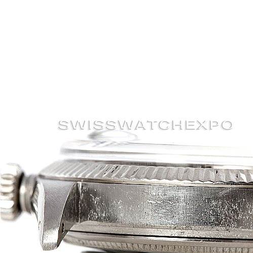This image shows a side profile view of the Rolex Vintage Collection 1603 Men's Stainless Steel Silver Dial 1603 Men's Stainless Steel Silver Dial watch, highlighting the crown, bezel, and case.