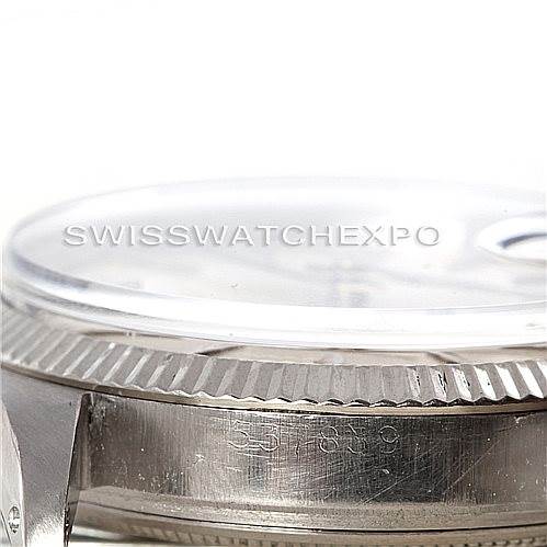 This image shows a close-up side view of the Rolex Vintage Collection 1603 Men's Stainless Steel Silver Dial 1603 Men's Stainless Steel Silver Dial model's bezel, crystal, and case.