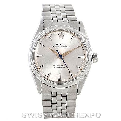 The image shows a frontal view of a Rolex Vintage Collection 1003 Men's Stainless Steel Silver Dial 1003 Men's Stainless Steel Silver Dial watch, displaying its face, bezel, and part of the metal bracelet.