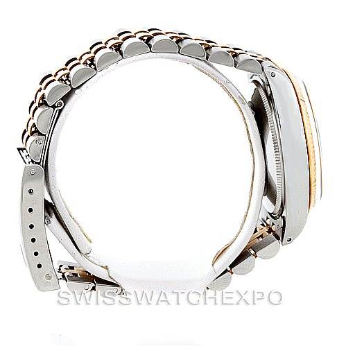 The image shows a side view of the Rolex Vintage Collection 1005 Men's Stainless Steel Champagne Dial 1005 Men's Stainless Steel Champagne Dial model watch, highlighting its band and case.