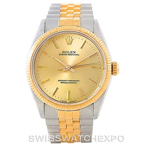 This image shows a front view of the Vintage Collection Rolex Oyster Perpetual watch, highlighting its gold dial, bezel, and two-tone bracelet.