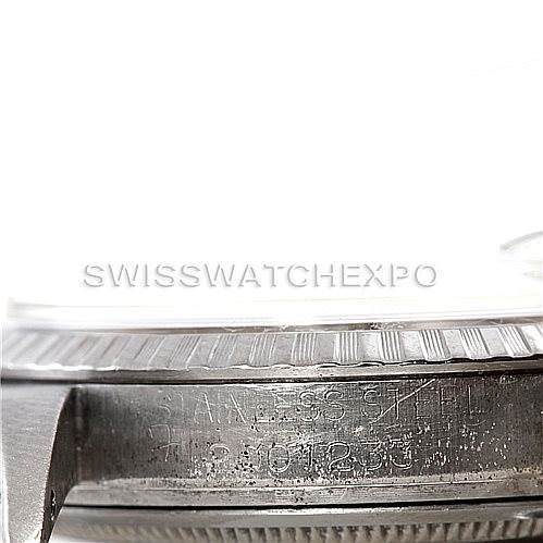 The image shows a close-up side view of the case and bezel of a Rolex Vintage Collection 1603 Men's Stainless Steel Silver Dial 1603 Men's Stainless Steel Silver Dial watch, highlighting the engravings.