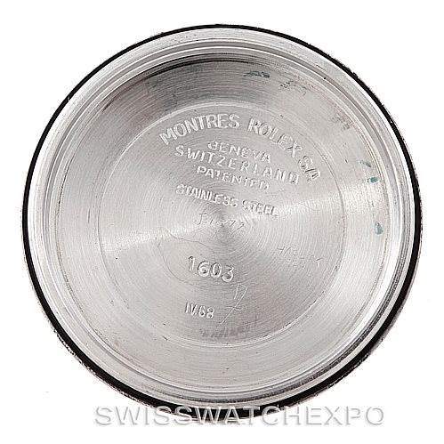 The image shows the inside case back of a Vintage Collection model Rolex watch, displaying engravings including the brand and stainless steel details.