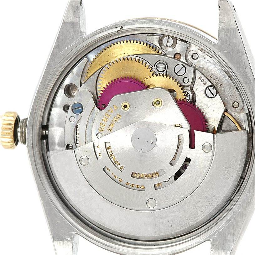 The image shows the back view of the Rolex Vintage Collection 5501 Men's Steel and Gold (two tone) Silver Dial 5501 Men's Steel and Gold (two tone) Silver Dial watch, highlighting its internal mechanism.