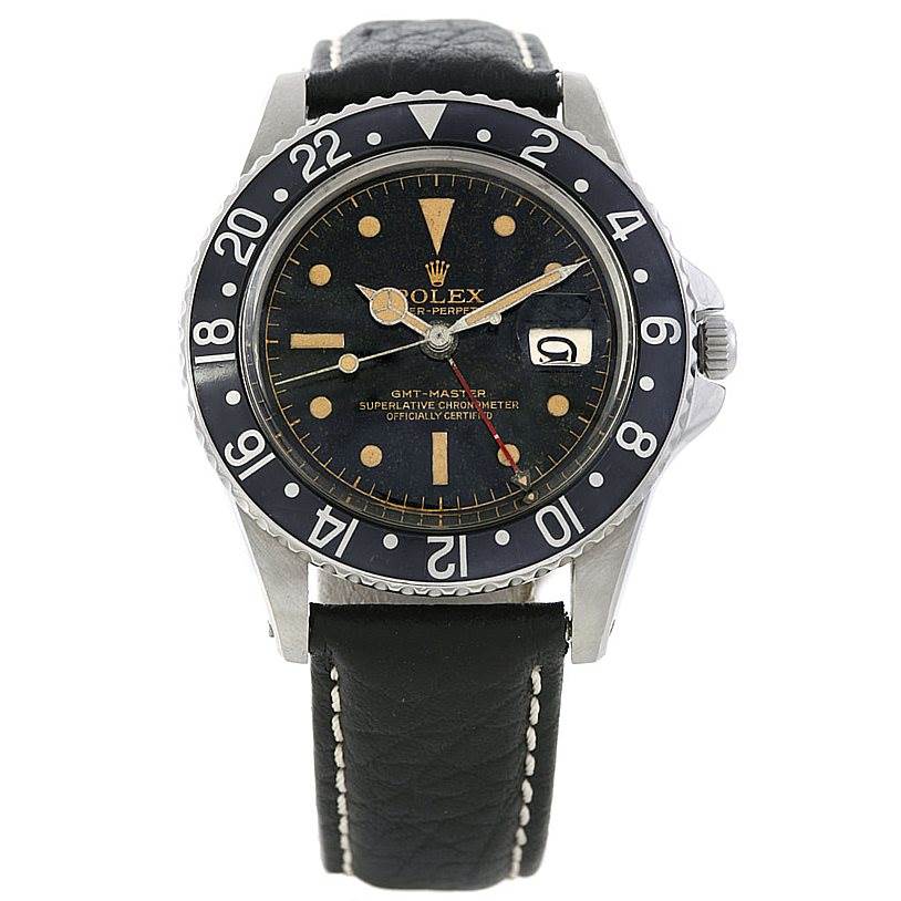 The image shows a front view of the Rolex Vintage Collection 1675 Men's Stainless Steel Black Dial 1675 Men's Stainless Steel Black Dial GMT-Master watch, highlighting its face, bezel, crown, and leather strap.