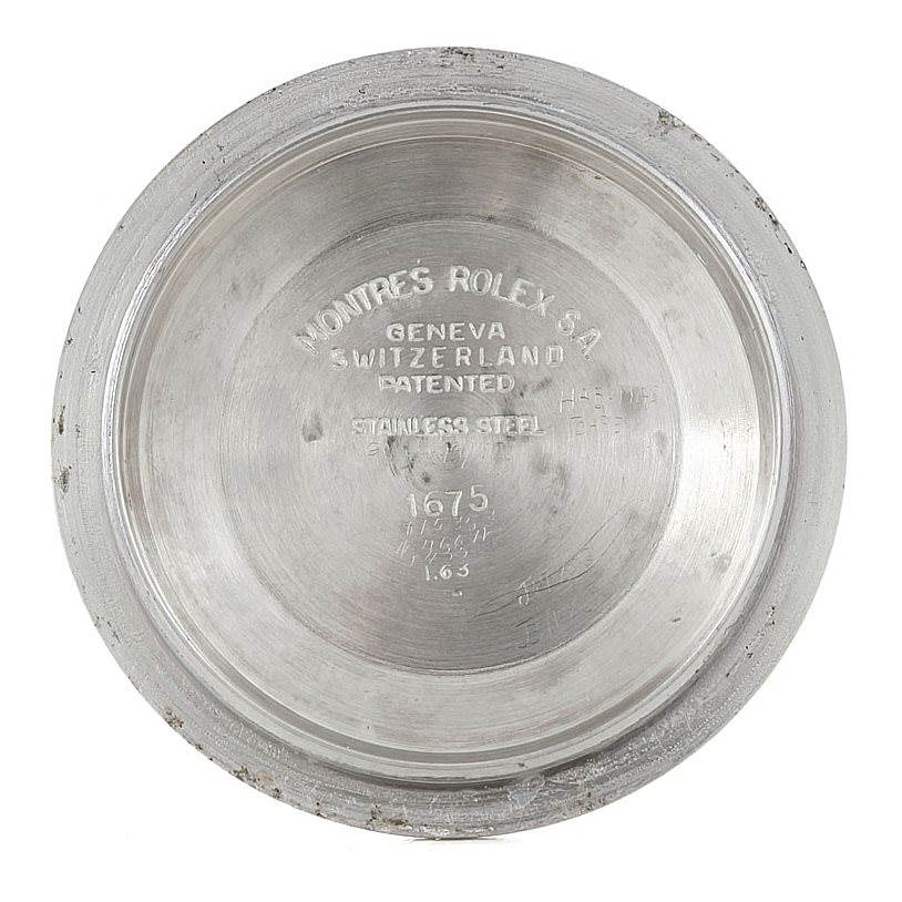 This image shows the inside case back of a Vintage Collection Rolex watch, highlighting internal engravings and markings.