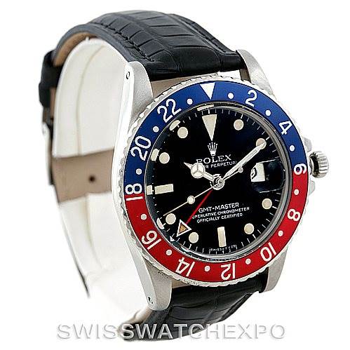 The image shows a Vintage Collection Rolex GMT-Master watch at an angled view, highlighting the bezel, dial, and strap.