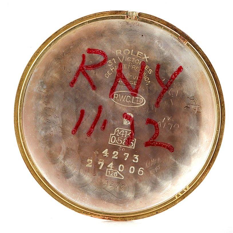 The image shows the inside of the case back of a Rolex Vintage Collection 4273 Men's Rose Gold Pink Dial 4273 Men's Rose Gold Pink Dial model watch with various engravings.