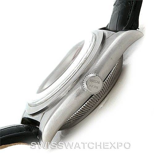 The image shows a side angle of the Rolex Vintage Collection 2940 Men's Stainless Steel Silver Dial 2940 Men's Stainless Steel Silver Dial watch focusing on the case, crown, and part of the leather strap.