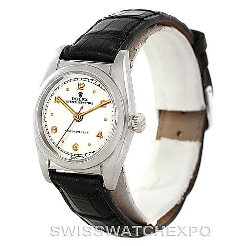 The image shows a Rolex Vintage Collection 2940 Men's Stainless Steel Silver Dial 2940 Men's Stainless Steel Silver Dial watch at a front angle with a white dial, black leather strap, and a silver case.