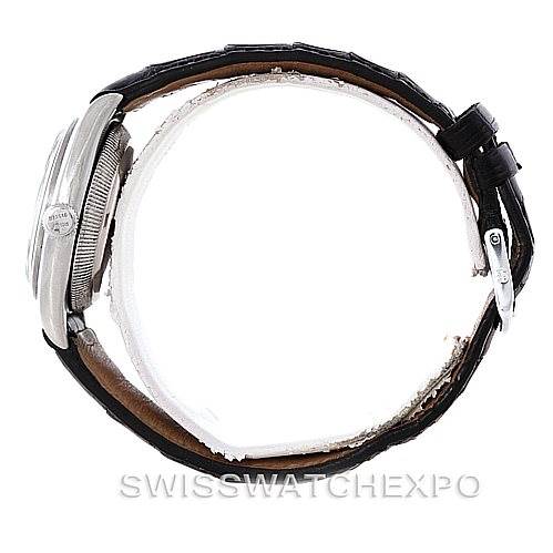 The image shows a side view of the case and crown of a Rolex Vintage Collection 2940 Men's Stainless Steel Silver Dial 2940 Men's Stainless Steel Silver Dial watch with a leather strap.