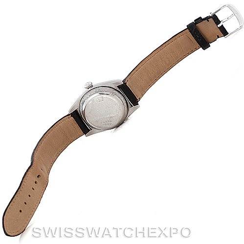 The Rolex Vintage Collection 2940 Men's Stainless Steel Silver Dial 2940 Men's Stainless Steel Silver Dial watch is shown from the back, highlighting the case back and leather strap.