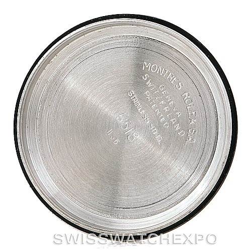 The image shows the inside case back of a Rolex Vintage Collection 6518 Men's Stainless Steel Black Dial 6518 Men's Stainless Steel Black Dial watch with inscriptions indicating material and origin details.