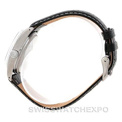 The image shows the side view of a Rolex Vintage Collection 6518 Men's Stainless Steel Black Dial 6518 Men's Stainless Steel Black Dial watch with a leather strap and visible crown.