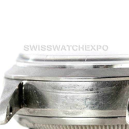 The image shows a close-up side view of the case and lugs of a Vintage Collection Rolex watch.
