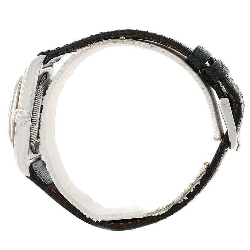 The Rolex Vintage Collection 3121 Men's Stainless Steel Brown Dial 3121 Men's Stainless Steel Brown Dial watch is shown from a side angle, highlighting the case, crown, and leather strap with a buckle.