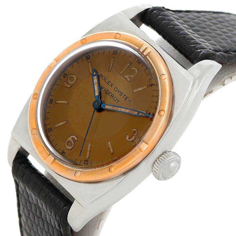 The image shows a Rolex Vintage Collection 3121 Men's Stainless Steel Brown Dial 3121 Men's Stainless Steel Brown Dial model at a slight angle, highlighting its face, bezel, crown, and black textured strap.