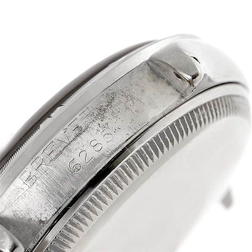 This close-up shows the side and bezel of the Rolex Vintage Collection 6285 Men's Stainless Steel Silver Dial 6285 Men's Stainless Steel Silver Dial model, highlighting the reference number and "BREVET" engraving.