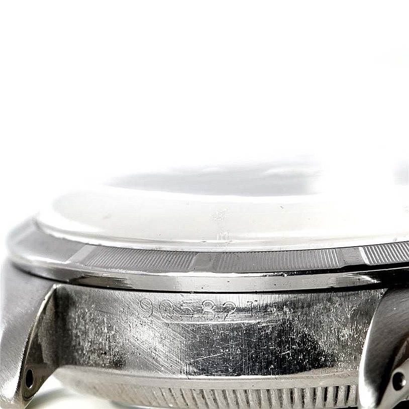 The image shows a close-up side view of the case and bezel of the Rolex Vintage Collection 6285 Men's Stainless Steel Silver Dial 6285 Men's Stainless Steel Silver Dial watch.