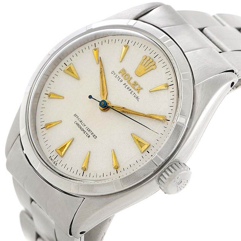 The image shows a close-up, side angle of a Rolex Vintage Collection 6285 Men's Stainless Steel Silver Dial 6285 Men's Stainless Steel Silver Dial watch, capturing the face, crown, and part of the bracelet.