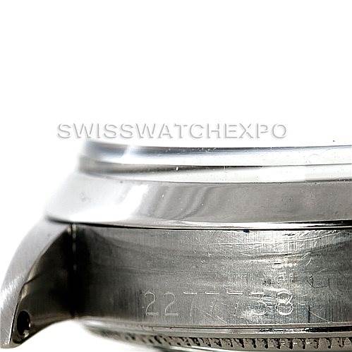 This image shows a close-up angle of the side case and bezel of a Vintage Collection model by Rolex.