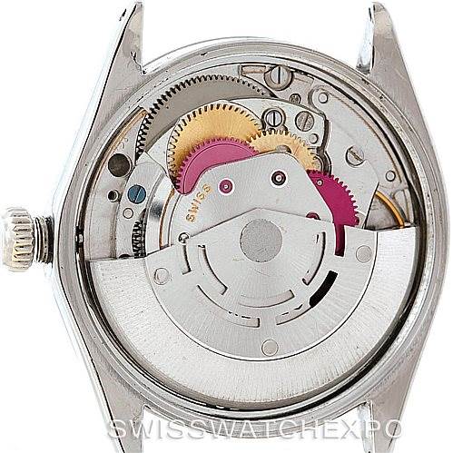 This image shows the interior mechanical movement of a Vintage Collection Rolex watch from the back angle.